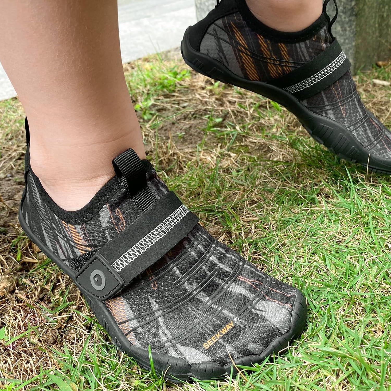 imageSEEKWAY Barefoot Water Shoes for Kids Wide Toe Box and QuickDry Sand Shoes Toddler for Hiking Swim Beach Pool Kayak Sport Accessories Camping Essentials MustHaves for Boys Girls Sizes1cblack Orange